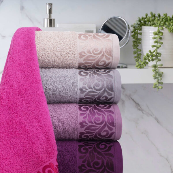 Stack of Lotus Bath Sheets 160x90 cm in an array of rich colors, each signifying the lavish comfort and expert Syrian craftsmanship