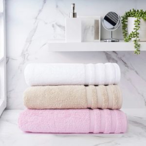 White, beige, and pink Windsor Hand Towel s stacked, displaying opulent texture and craftsmanship. Egyptian Cotton